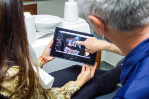 A dentist discussing a patient's dental issue