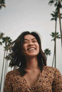 An image of a smiling woman