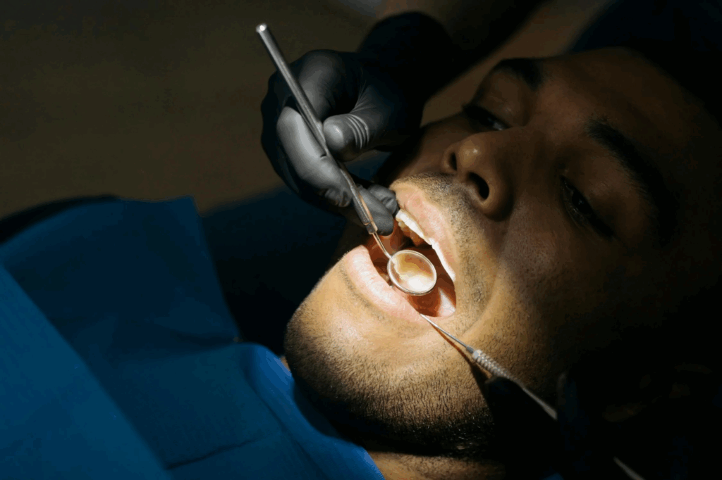 close-up shot of a man getting a dental check-up