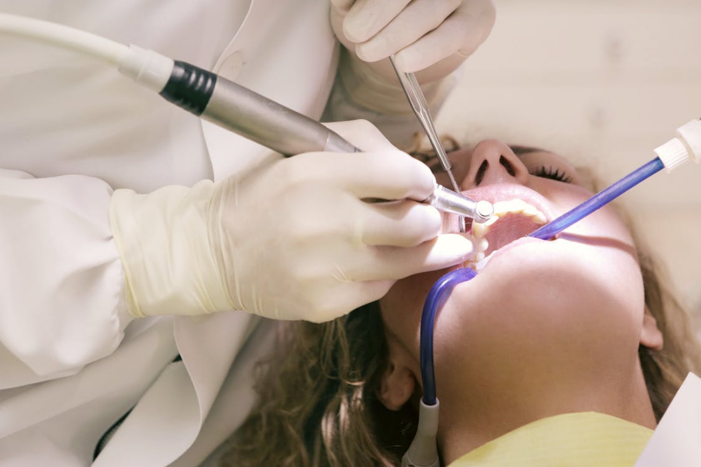 This photo shows a woman undergoing a dental treatment