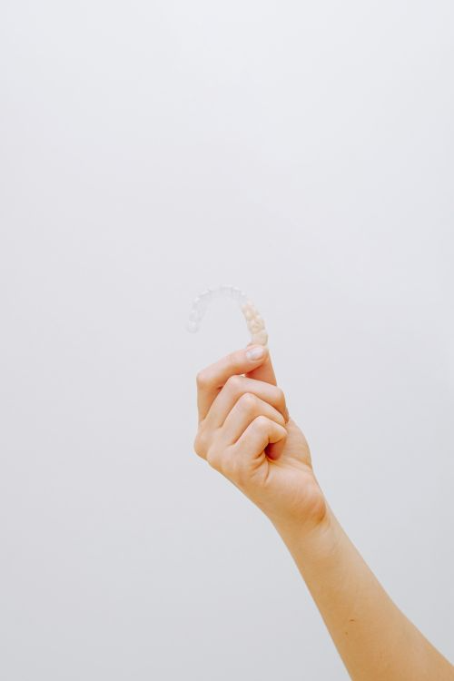 You are currently viewing What Adults Should Know About Invisalign vs Traditional Braces